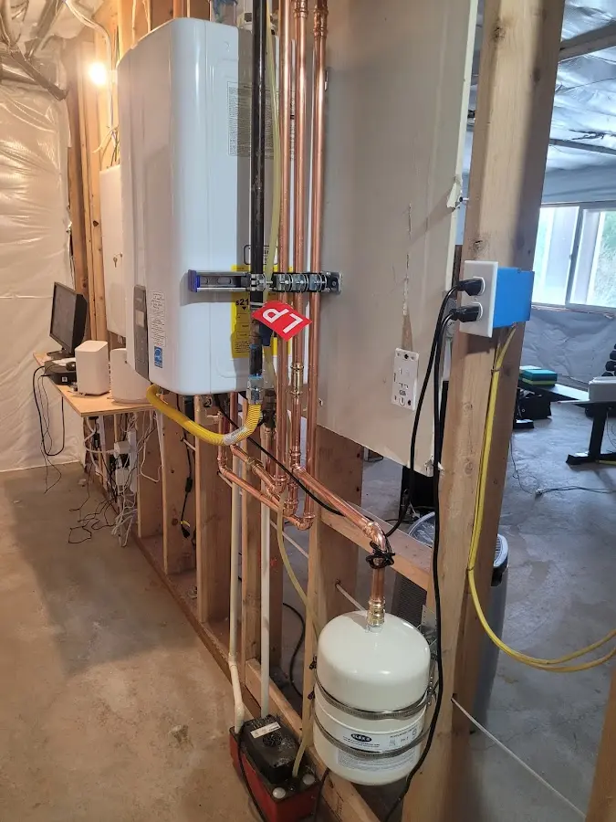 Licensed plumber repairing a kitchen sink in La Junta